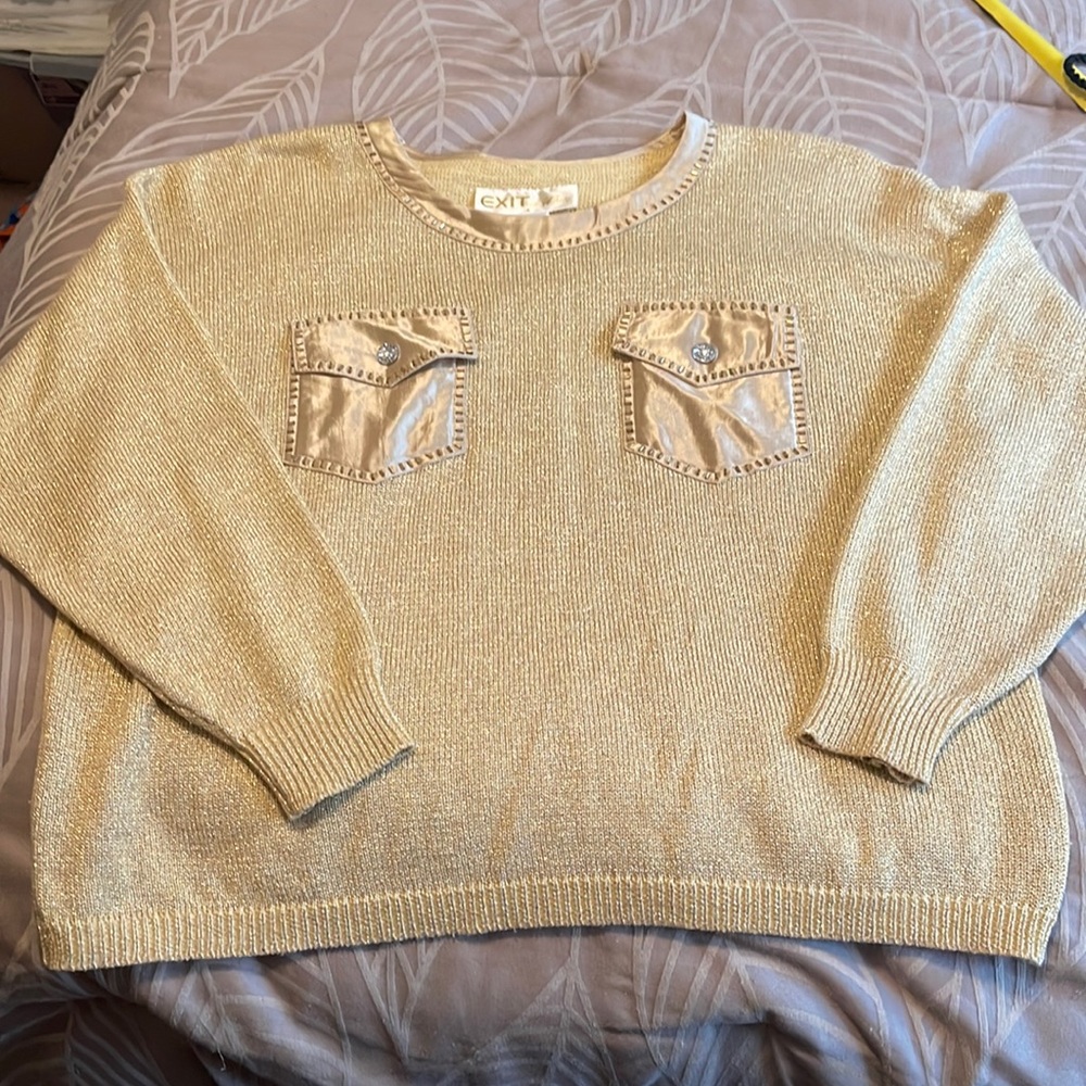 EXIT in White gold sweater